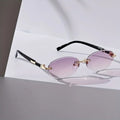 Vintage-Inspired Oval Frameless Fashion Glasses for Men Women Metal Frame Tone Accents Multiple Sunglasses Colors Available