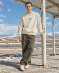 MAZZONNE Men's Beige Crew Neck Sweatshirt Letter Graphic Metal Stud Patch Long Sleeve Loose Fit Streetwear H
