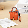 New Mini House Small Bag Leather Handheld Portable Hand Rope Bluetooth Earphone Bag Zero Wallet Multi Functional Small Bag